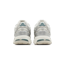 1906R - "Silver Metallic Cream"