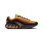 Tênis Nike Air Max DN SE em laranja, vermelho e preto — vista lateral
