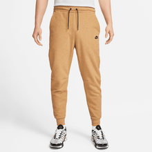 Calça Sportswear Nike Tech Fleece - Bege e Preto